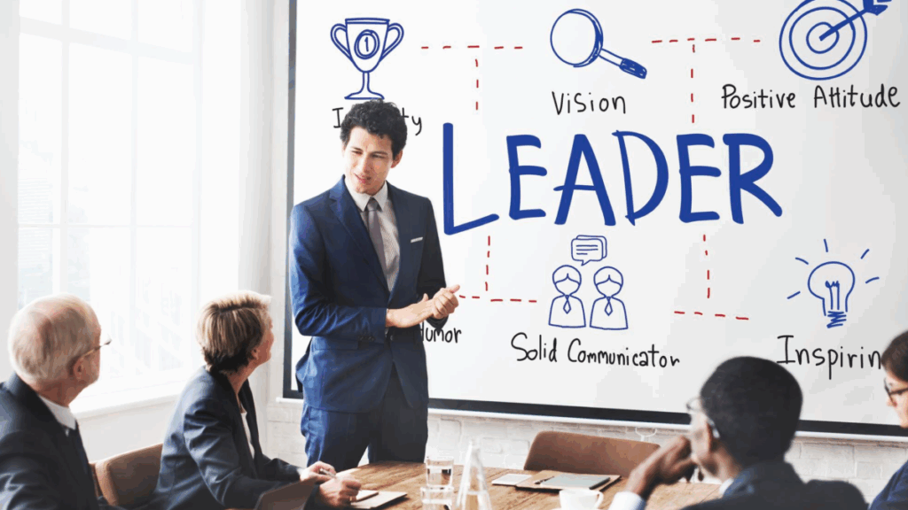 Man in front of a group of people presenting what scaling leadership represents.